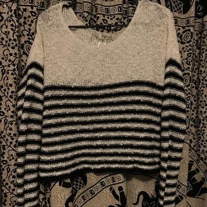 Saw What? White and black stripped sweatshirt.